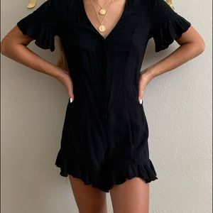 Black ruffle romper